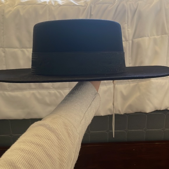 Black Sierra hat size small (55 cm) from Lack of Color. Original tags in place.